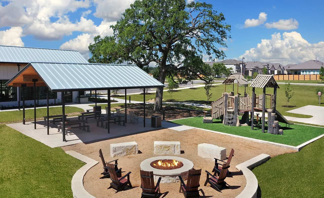 Meyer Ranch community with pavilion, playground, and fire pit in scenic park setting.