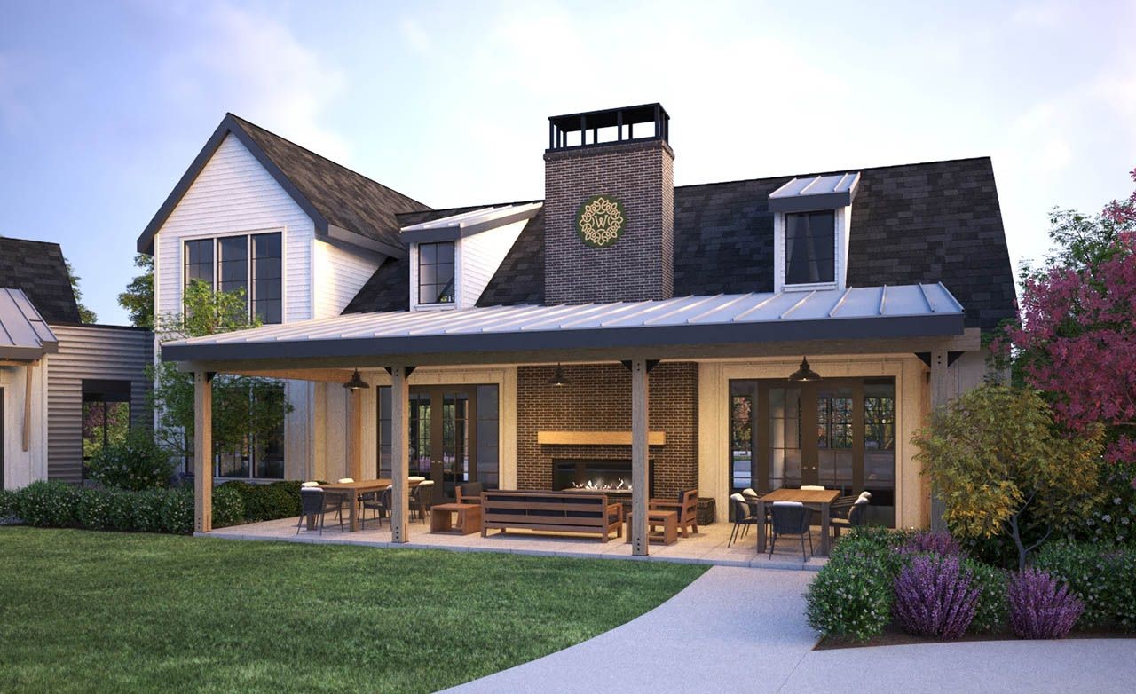 Modern home with gabled roof, outdoor fireplace, and lush landscaping in Westerly community.
