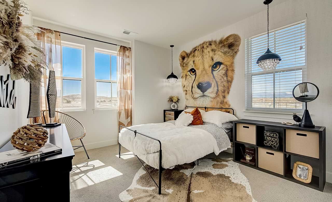 Stylish bedroom with cheetah mural, plush bed, and chic decor in Westerly community, large windows offer scenic views.