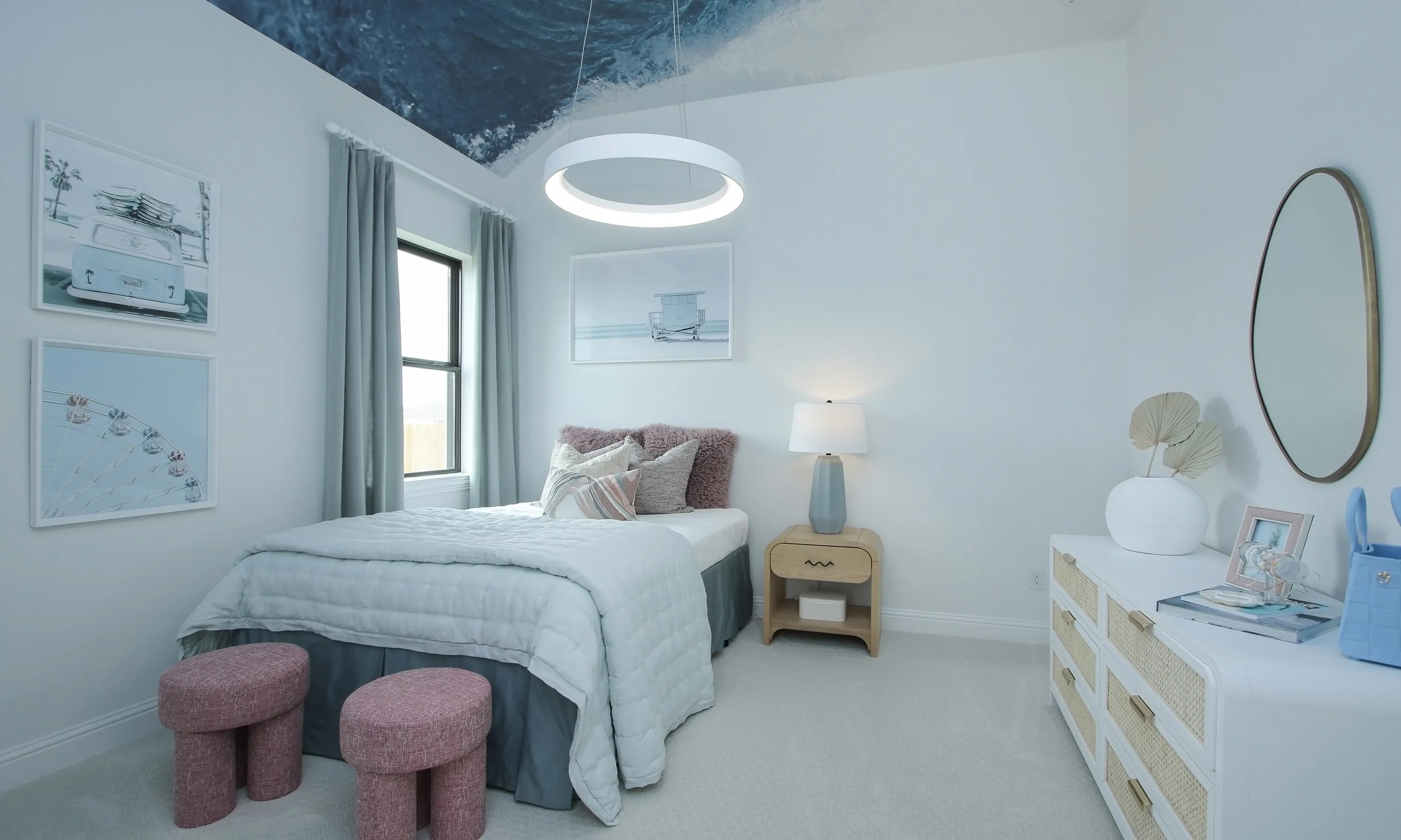 Coastal Point Bedroom with Ocean Ceiling and Modern Decor Elegant bedroom with coastal decor, featuring ocean-themed ceiling and plush furniture in Coastal Point community.