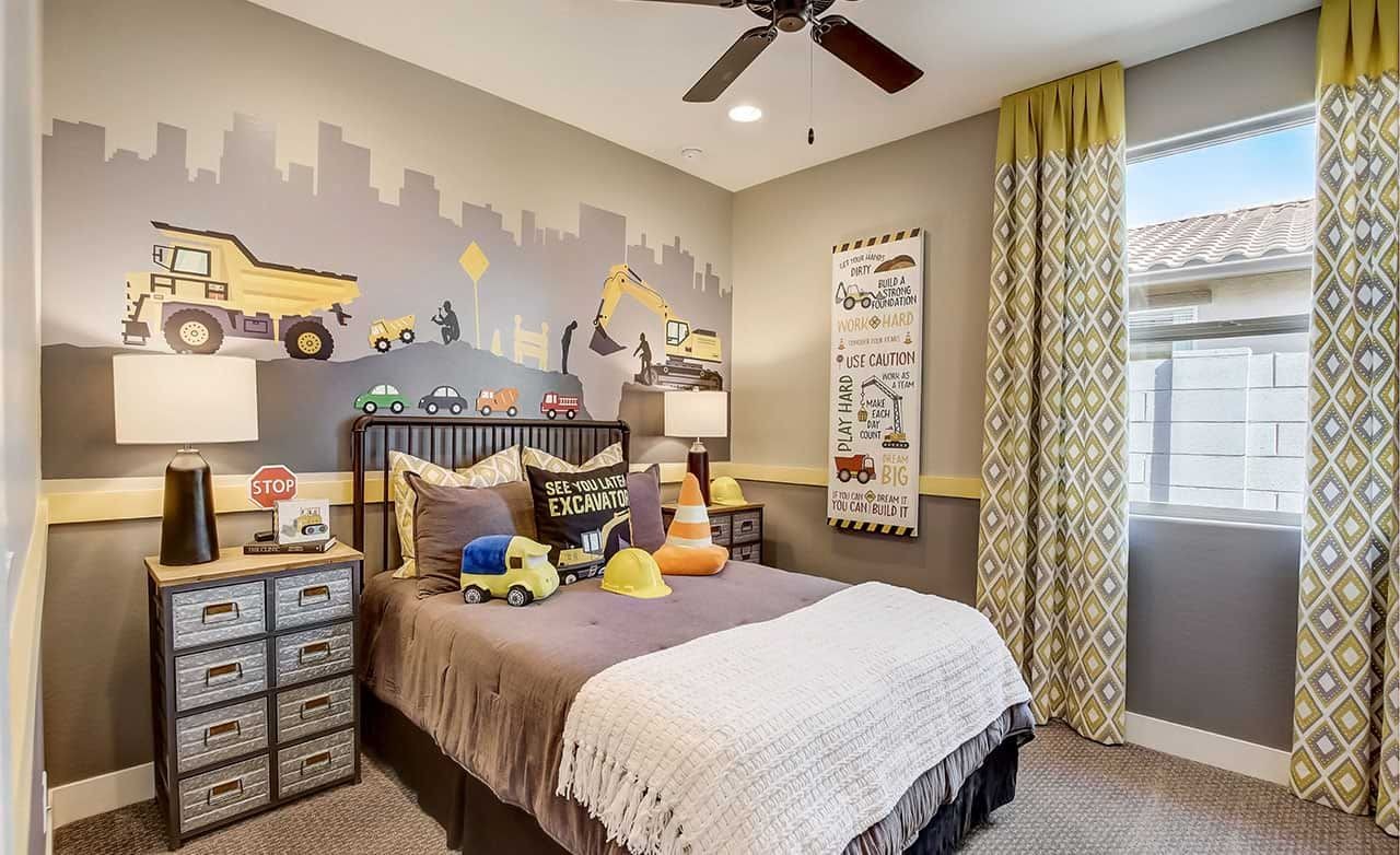 Construction-Themed Child's Room at Castillo at Anderson Parc Child's room with construction-themed mural, stylish furnishings, and large window at Castillo at Anderson Parc.