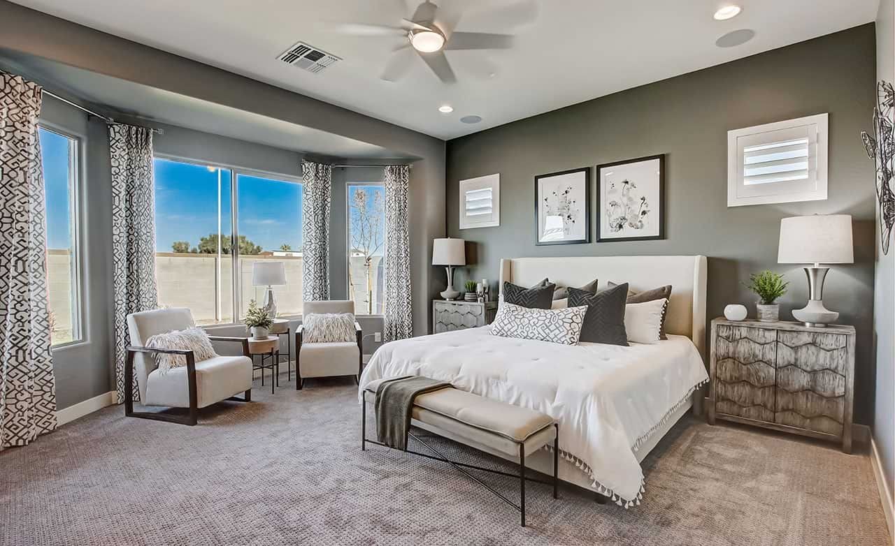 Elegant Bedroom with Large Windows in Mirada Crossing Community Luxurious bedroom featuring large windows, elegant decor, and premium furnishings in Mirada Crossing community.